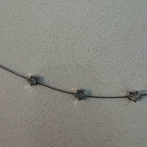 Silver bracelet with 3 stars with rhinestones.